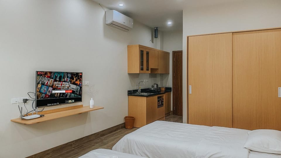 Photo of the whole room, minibar, wardrobe