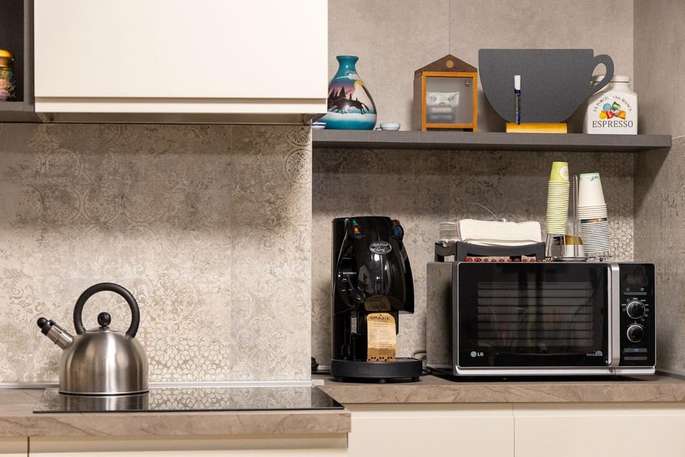 Kitchen or kitchenette, stove, toaster