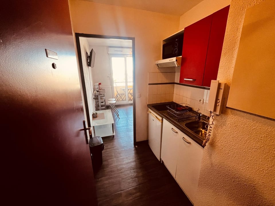 Kitchen or kitchenette, stove