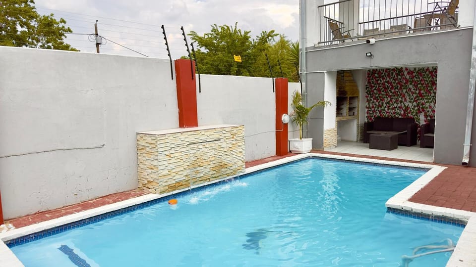 Property building, Patio, Pool view, Swimming pool