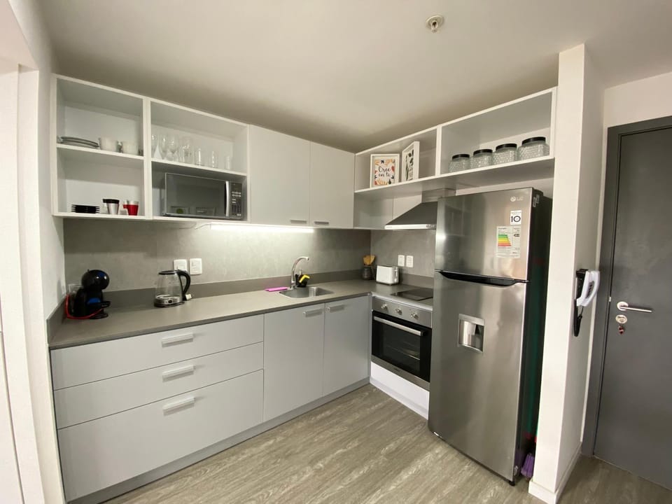 Kitchen or kitchenette, oven, toaster