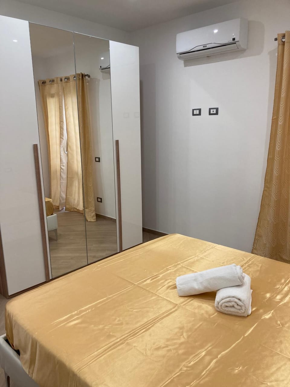 Bed, Photo of the whole room, Bedroom, towels, air conditioner