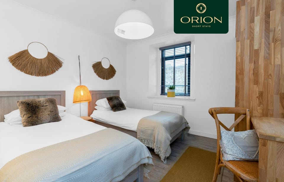 Bed, Property logo or sign, Bedroom