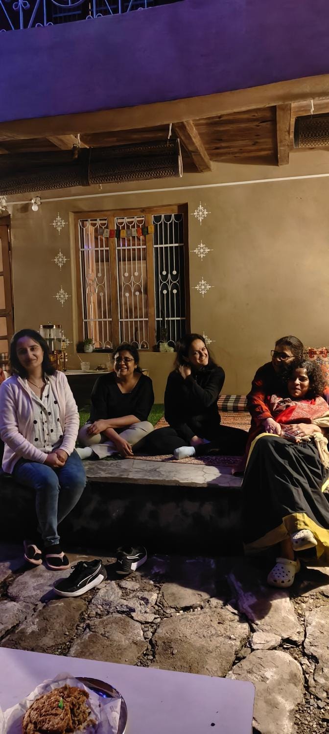 Communal lounge/ TV room, Night, People, Living room, Seating area, Garden view, group of guests