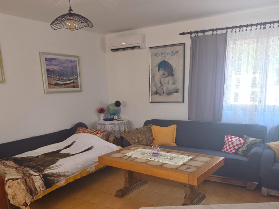 Bed, Living room, Seating area, Bedroom