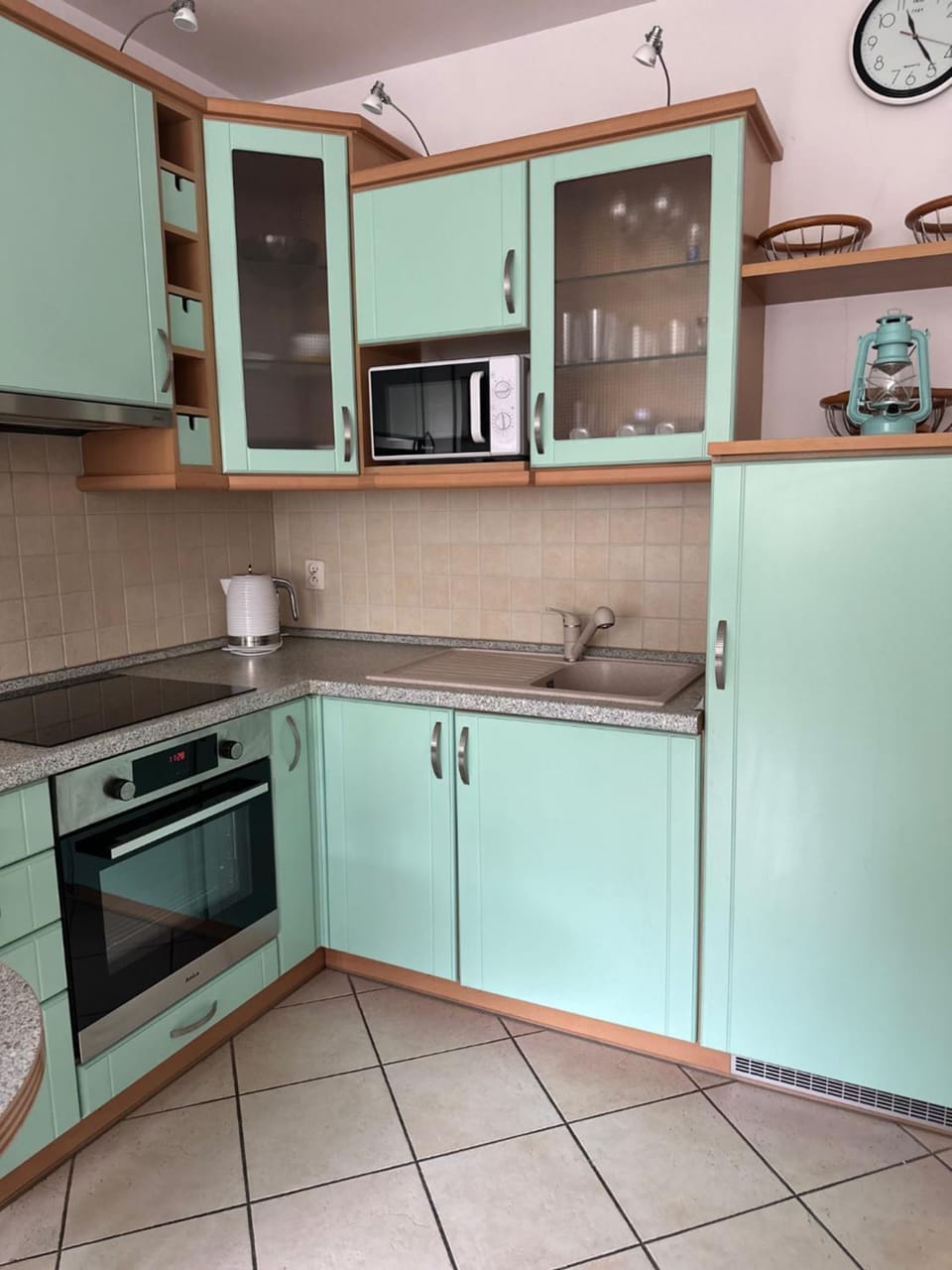 Kitchen or kitchenette, dishwasher, oven, stove