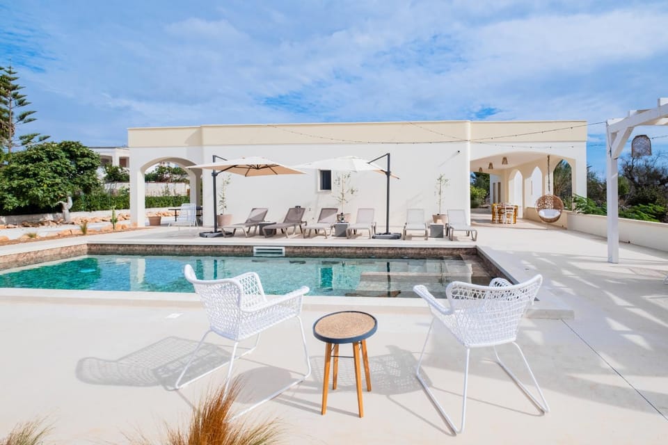 Property building, Patio, Day, Pool view, Swimming pool