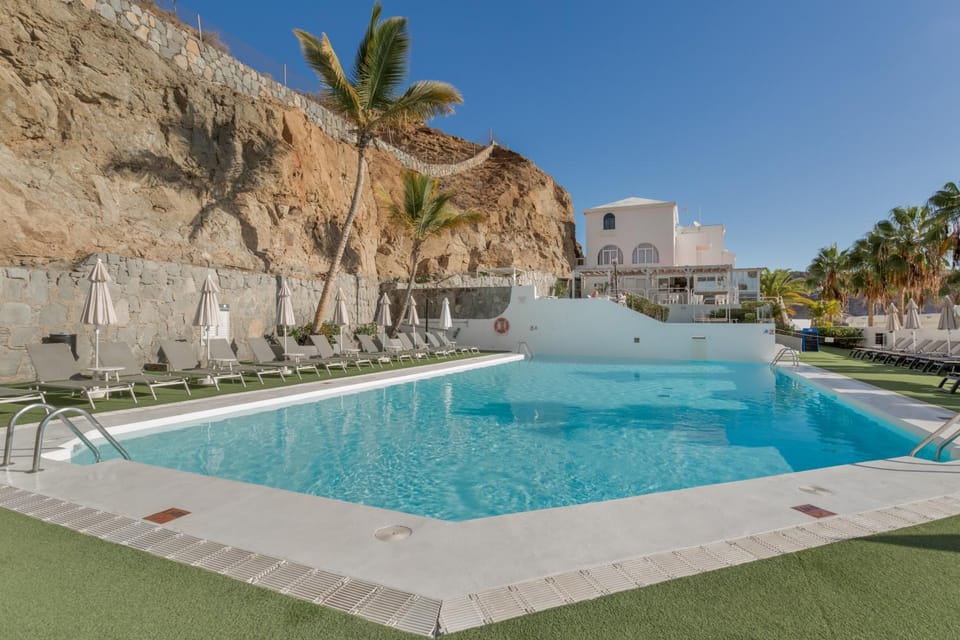 Property building, Living room, Swimming pool