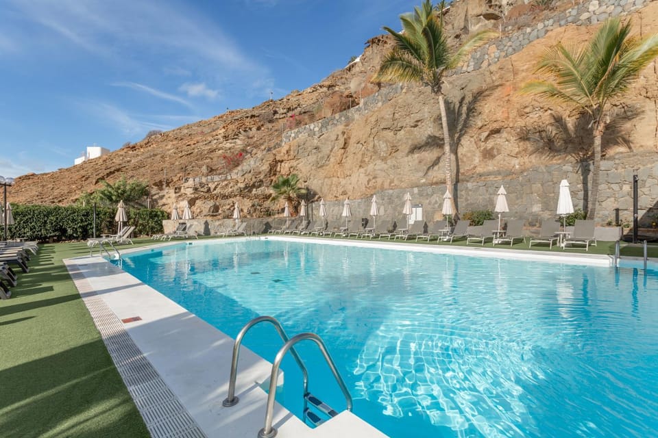 Property building, Living room, Swimming pool