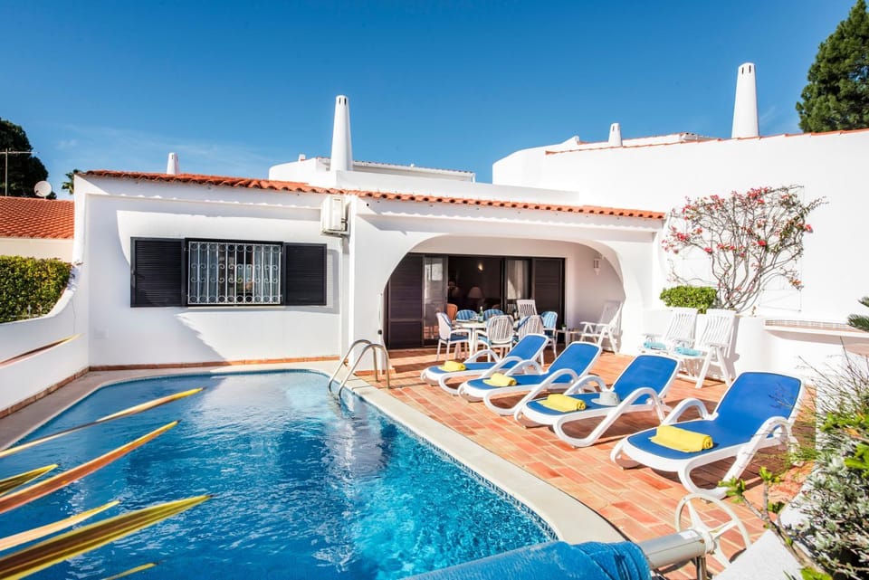 Property building, Living room, Swimming pool