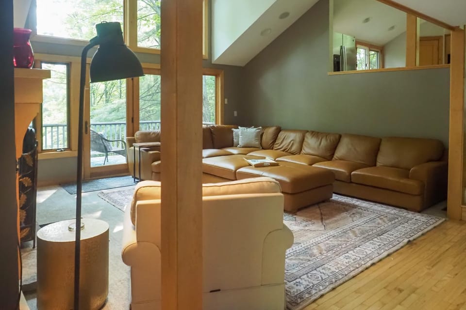 Nestled in the Woods, Walk to Town Suttons Bay House in Suttons Bay