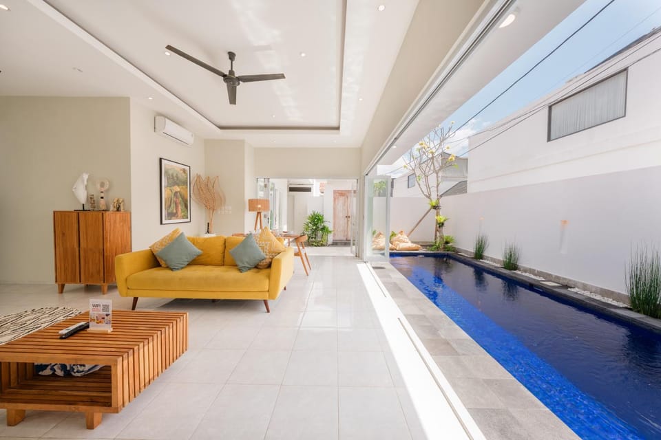Living room, Seating area, Pool view