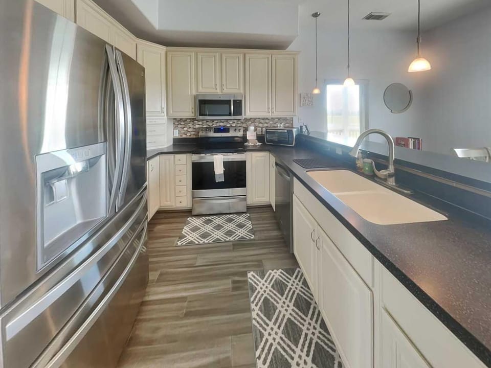 Kitchen or kitchenette, microwave, oven, stove, kitchen