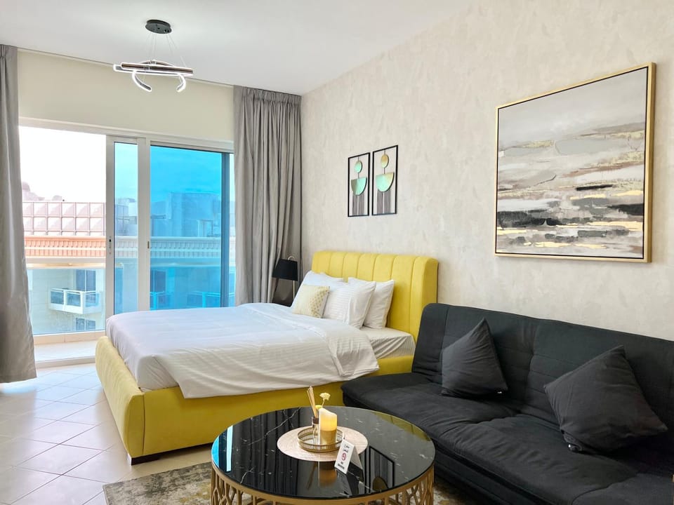 Bed, Living room, Seating area, Bedroom