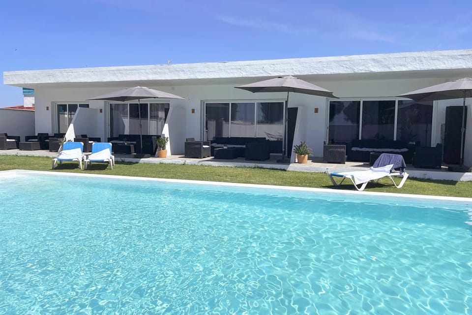 Property building, Pool view, Swimming pool, sunbed