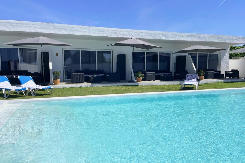 Property building, Pool view, Swimming pool, sunbed