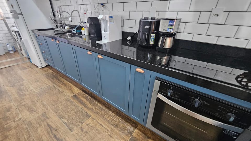 Kitchen or kitchenette, stove