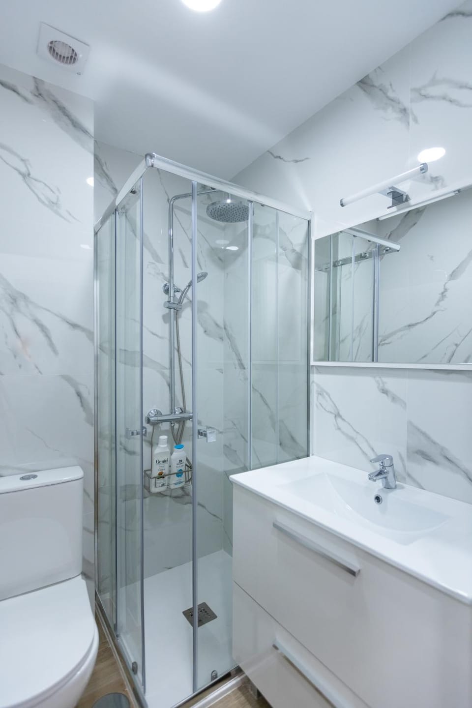 Shower, Toilet, Bathroom, hair dryier, towels
