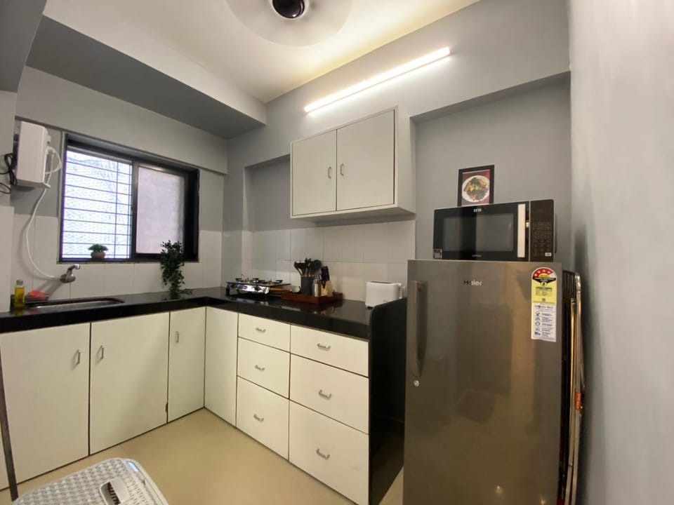 Kitchen or kitchenette, stove, toaster