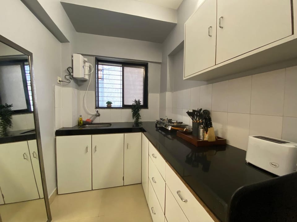 Kitchen or kitchenette, stove