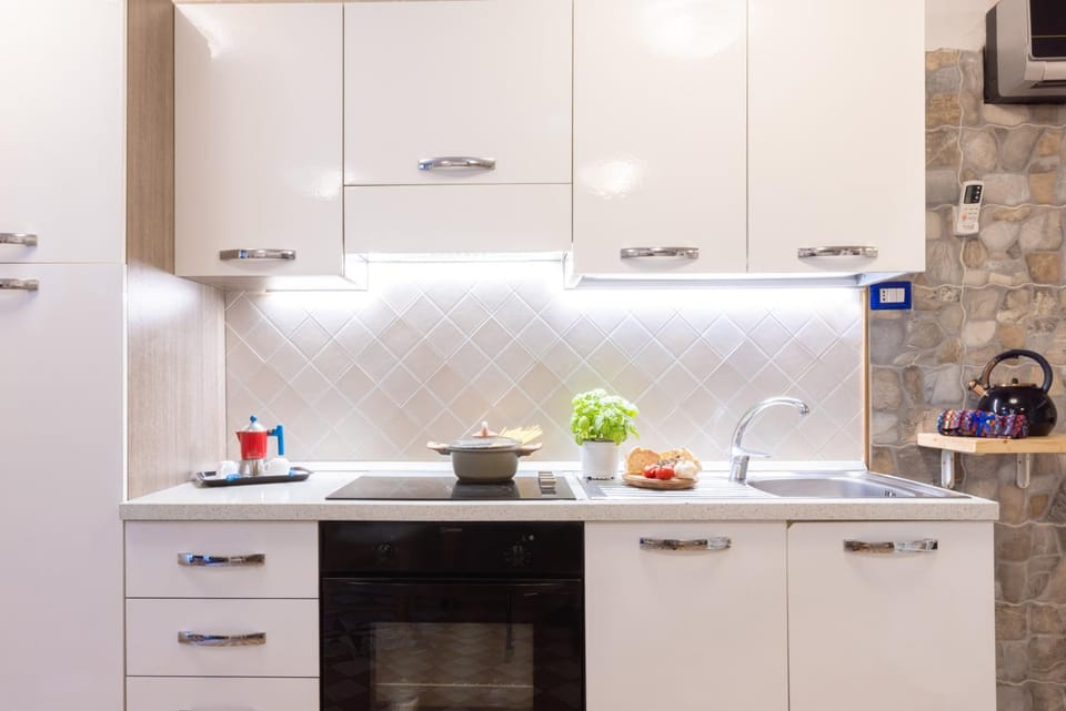 Kitchen or kitchenette, stove, kitchen