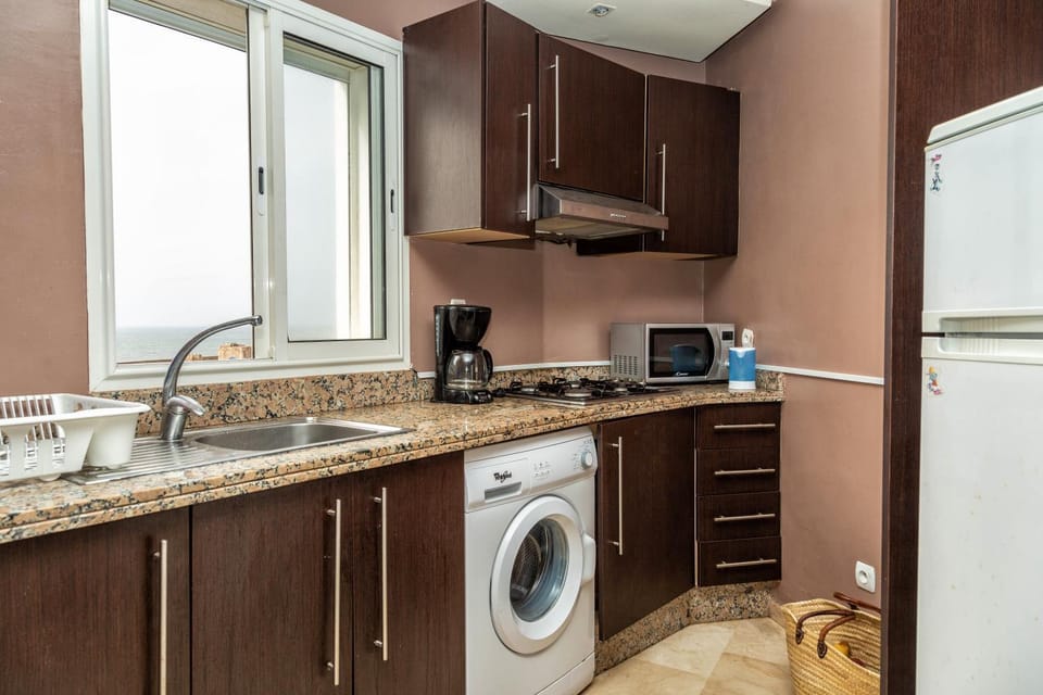 Kitchen or kitchenette, oven, stove, toaster, dryer