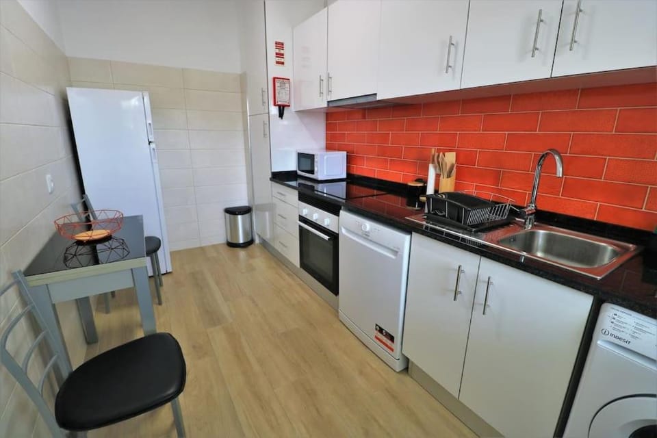 Apartamento laranja Quarteira Apartment in Quarteira