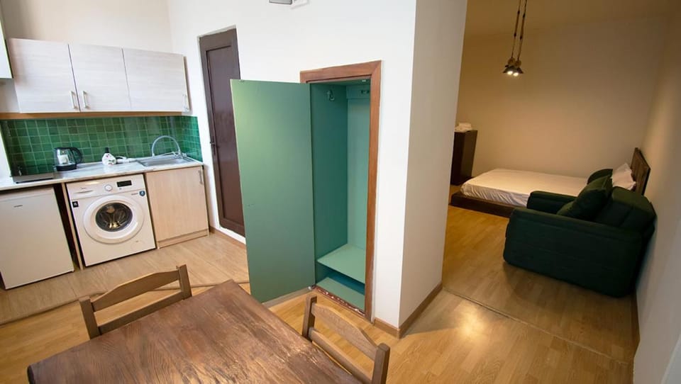 Kitchen or kitchenette, washing machine