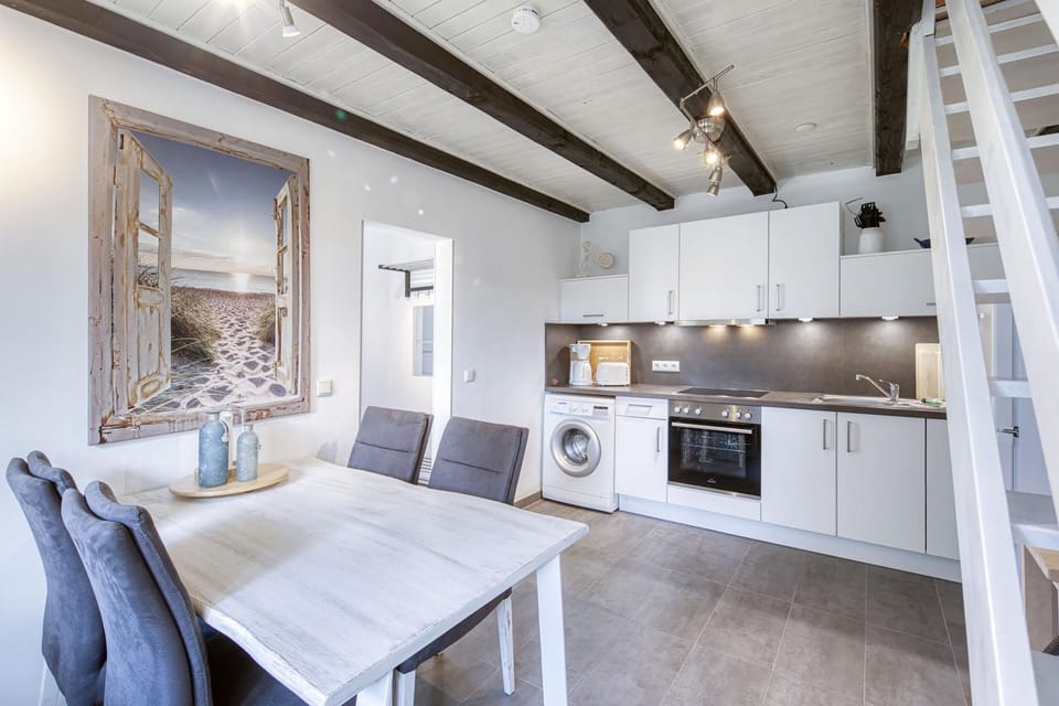 Kitchen or kitchenette, Seating area, Dining area, dishwasher, stove, washing machine