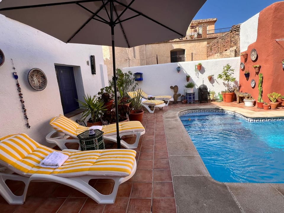 Patio, Day, Pool view, Swimming pool, sunbed
