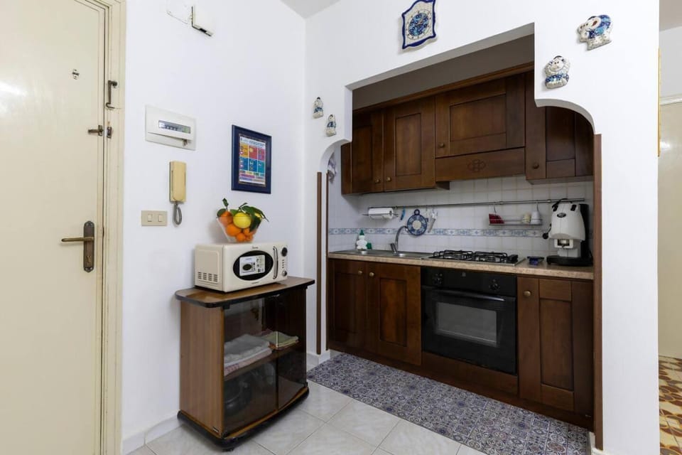 Kitchen or kitchenette, stove