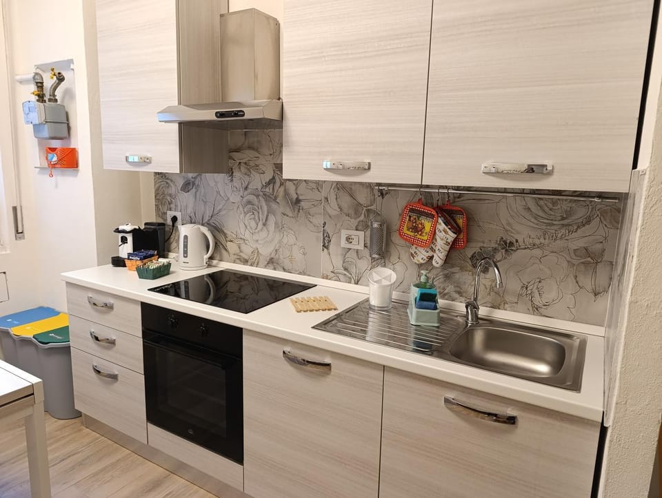 Kitchen or kitchenette, stove