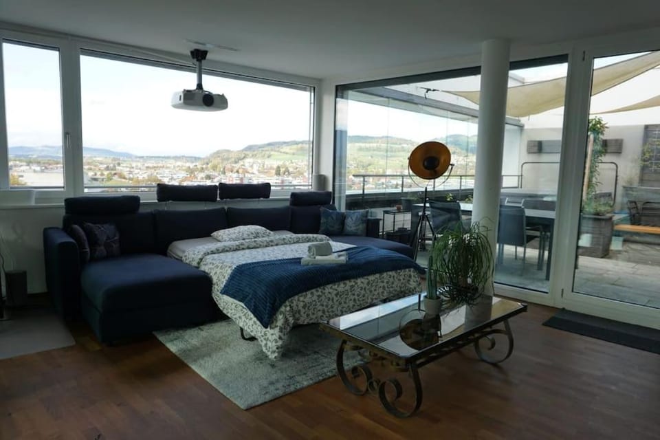 Bed, View (from property/room), Balcony/Terrace, Living room, Seating area, Mountain view