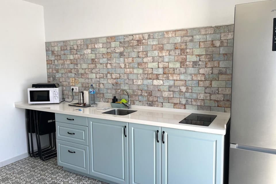 Kitchen or kitchenette, stove