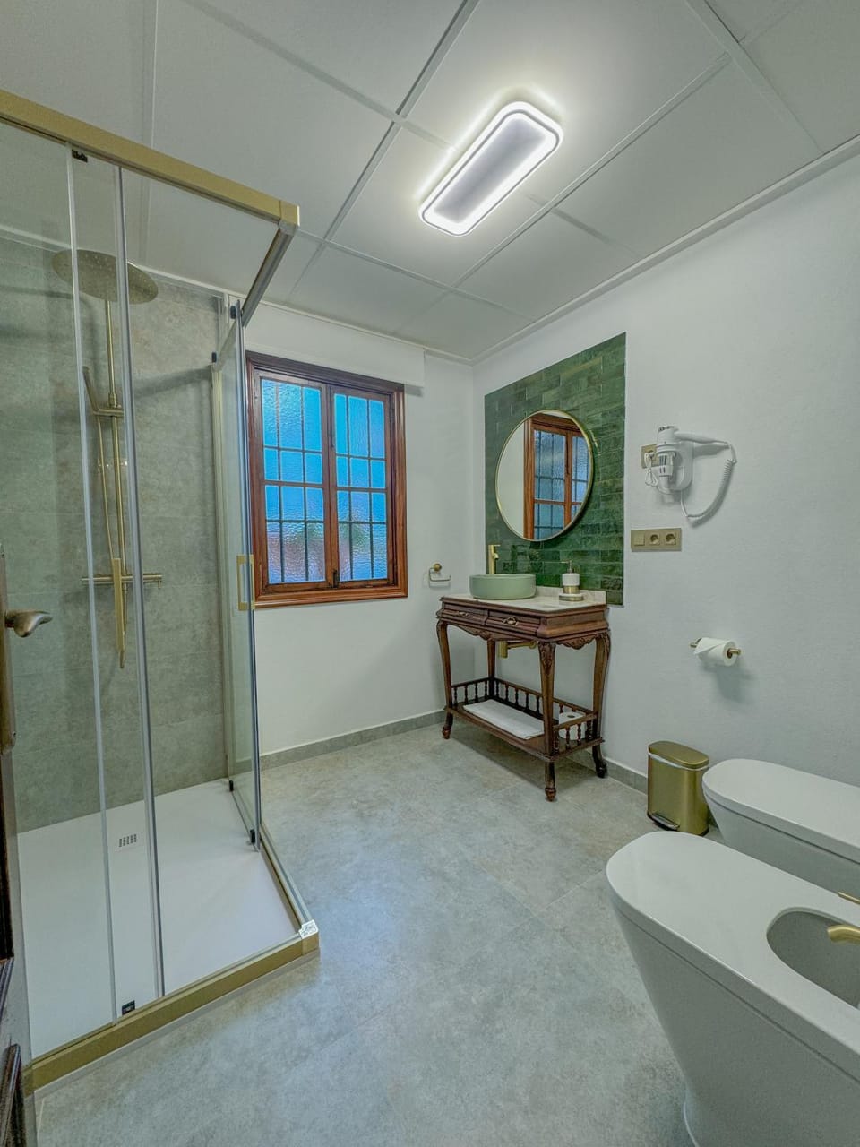 Shower, Bathroom, hair dryier, towels, air conditioner