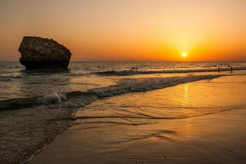 Nearby landmark, Natural landscape, Beach, Sunset