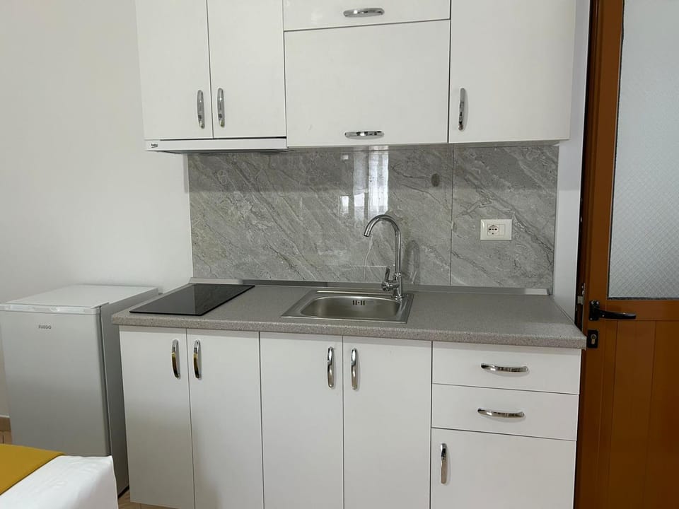 Kitchen or kitchenette, stove
