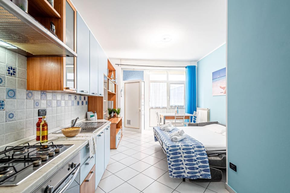 Living room, Dining area, dishwasher, microwave, oven, stove, kitchen