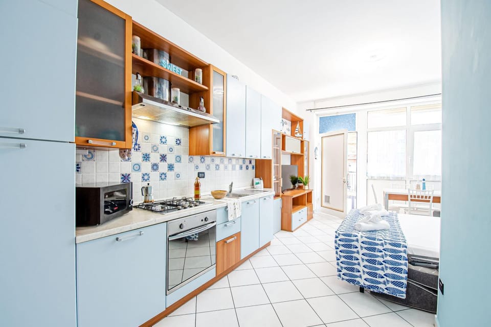 Living room, Dining area, dishwasher, microwave, oven, stove, kitchen