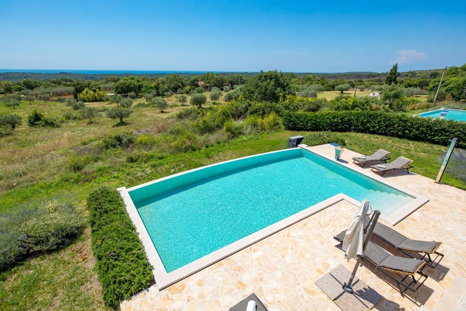Patio, Day, Natural landscape, Pool view, Sea view, Swimming pool, sunbed