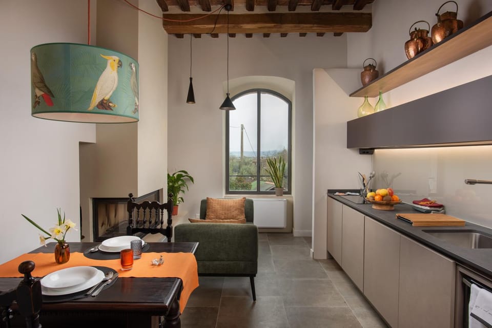 Kitchen or kitchenette, Living room, Seating area, Dining area, fireplace, fireplace
