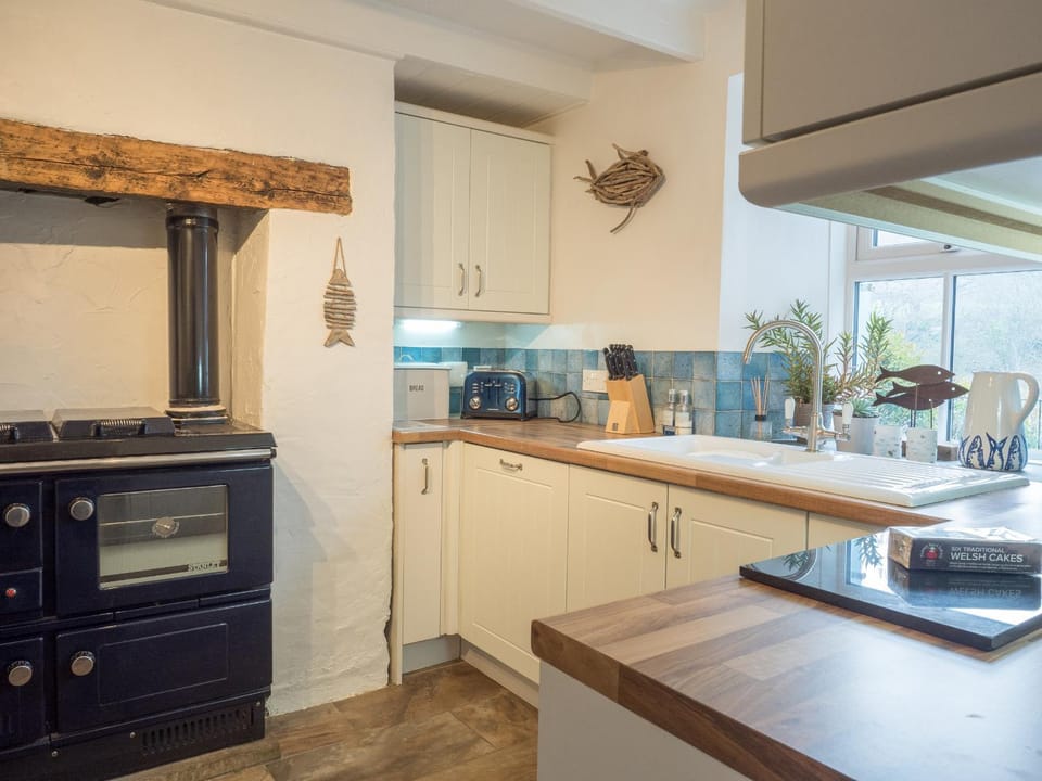Kitchen or kitchenette, oven, stove, toaster