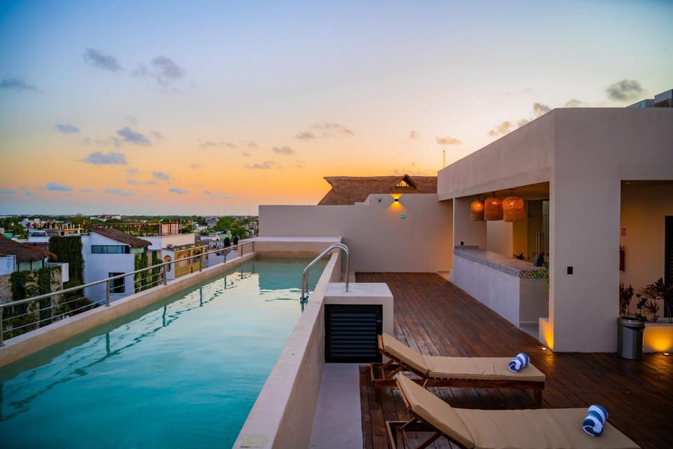 Property building, Patio, Day, View (from property/room), Balcony/Terrace, Pool view, Swimming pool, Sunrise, Sunset, sunbed