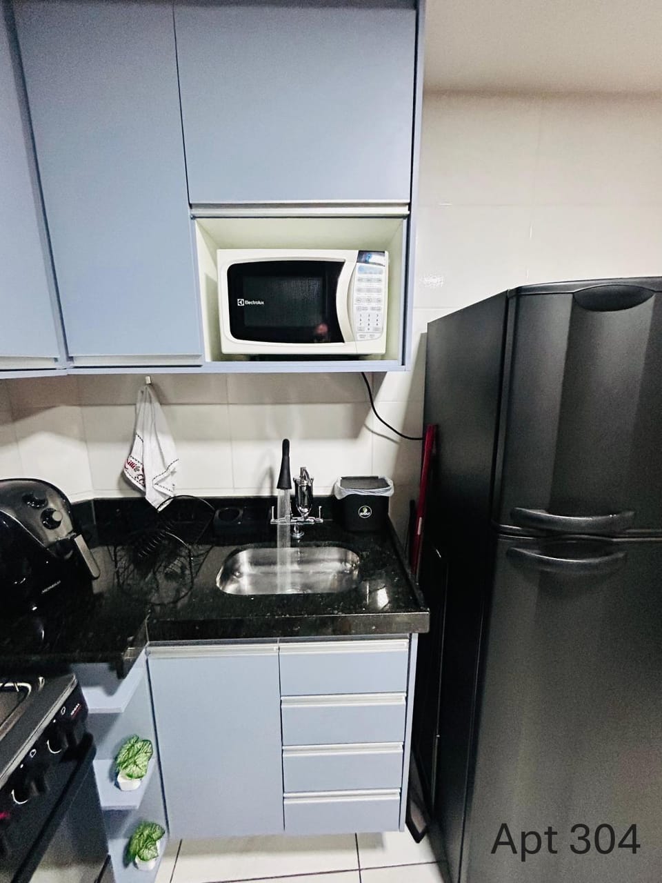 Kitchen or kitchenette, microwave