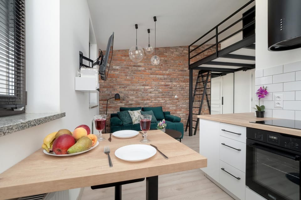 Kitchen or kitchenette, Living room, Seating area, Dining area