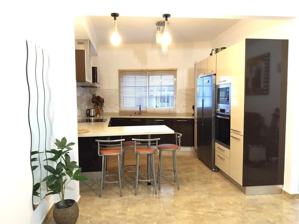 Kitchen or kitchenette, dishwasher, microwave, oven