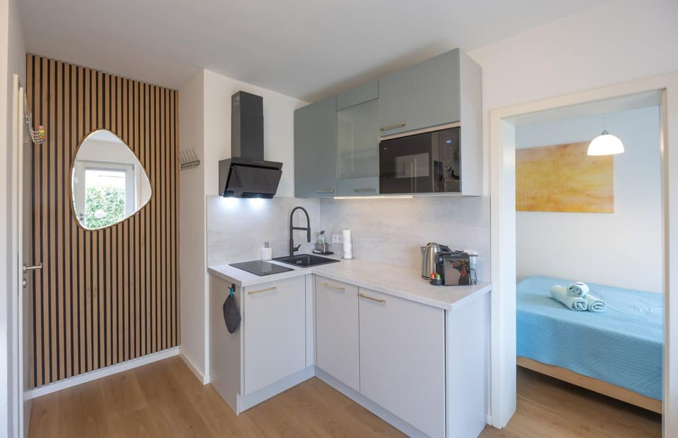 Kitchen or kitchenette, stove, kitchen