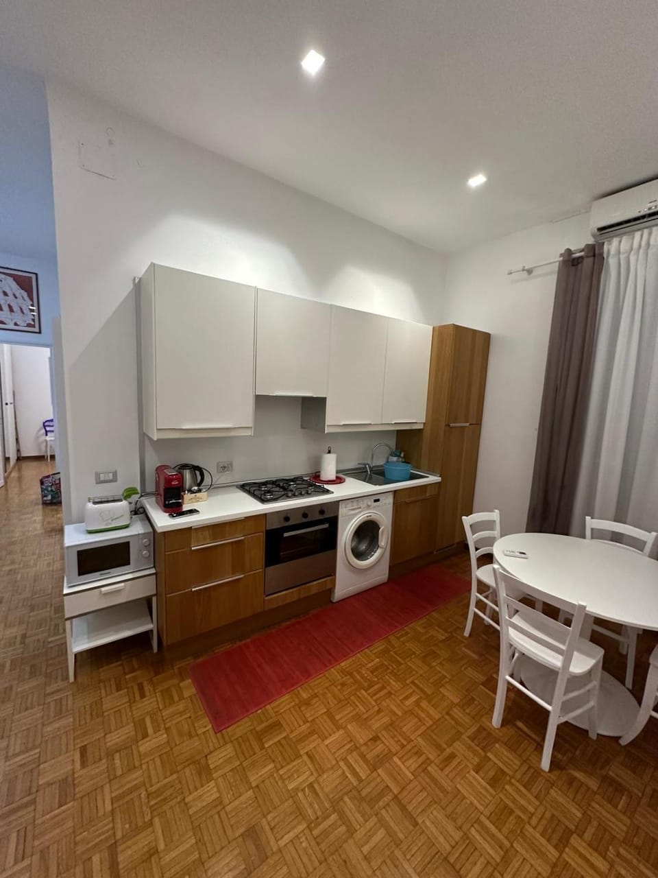 Kitchen or kitchenette, Dining area, oven, stove, washing machine