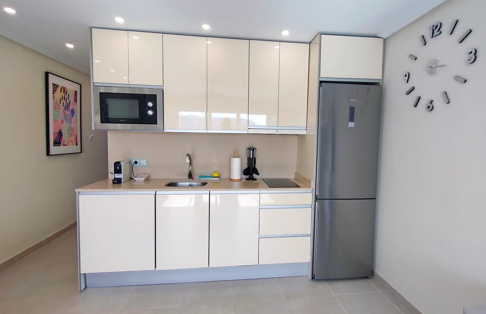 Kitchen or kitchenette, stove