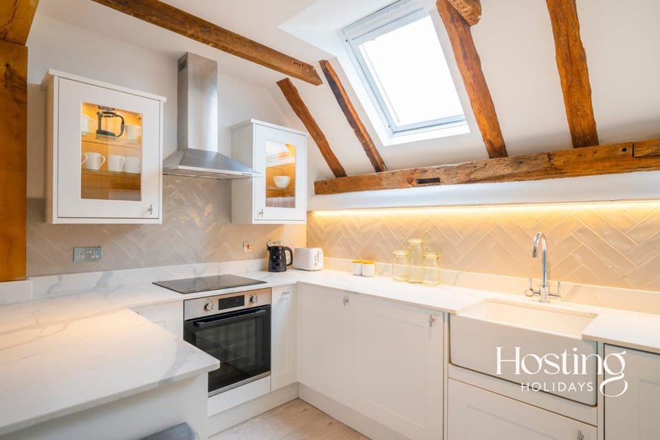 Kitchen or kitchenette, stove, toaster